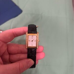 Elegant Black and Gold Women's Watch